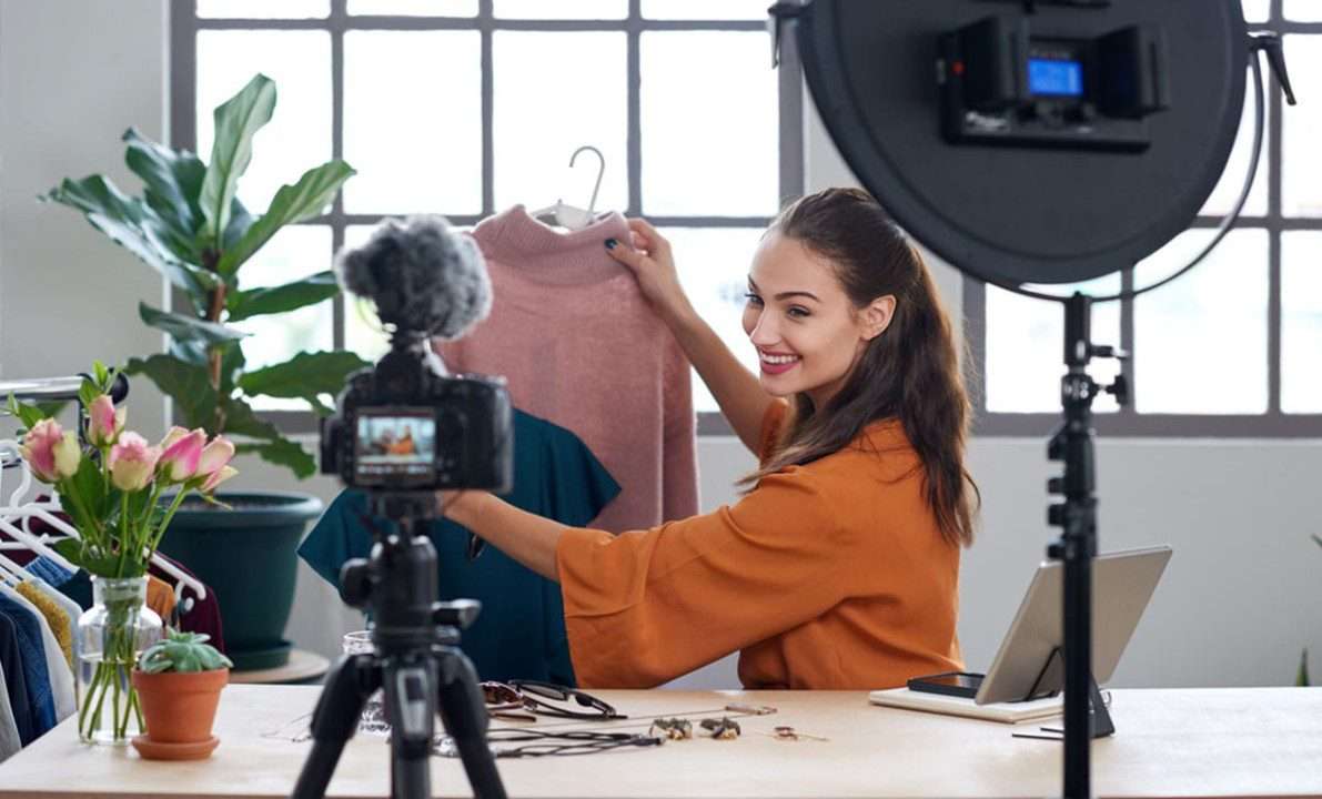 A girl showing her products on social media live using camera