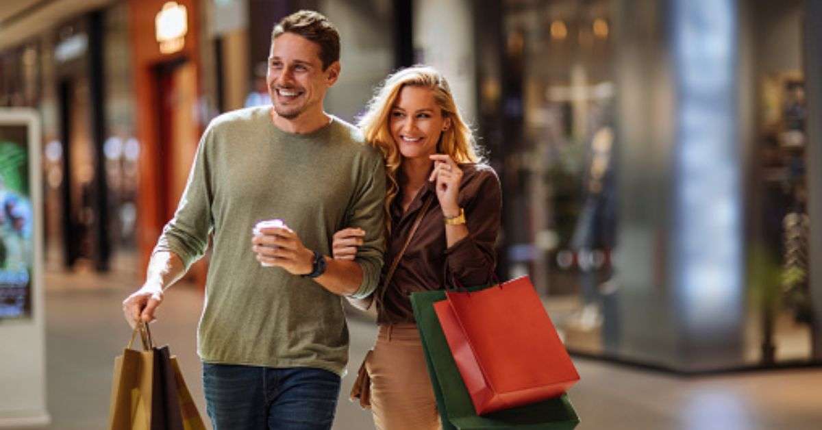 a couple with full of shopping bags