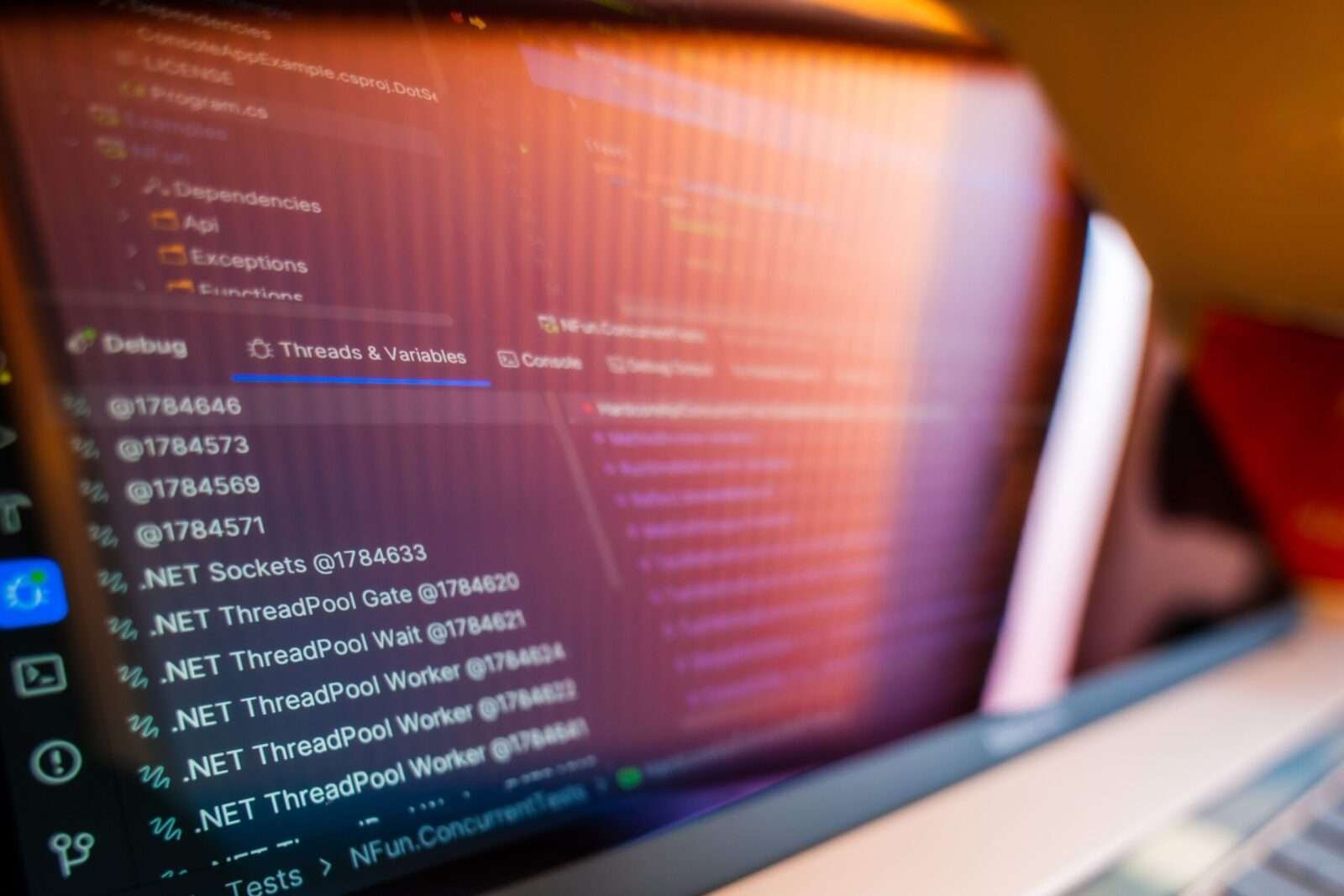 Focused view of a computer screen displaying code and debug information.